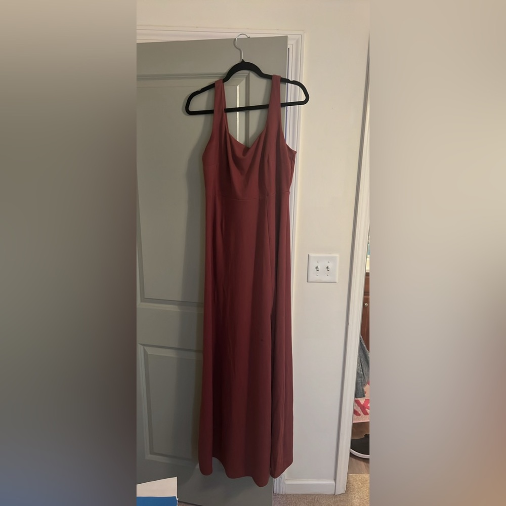 Size large (worn once)and x-large bridesmaid dress in the color rosewood.